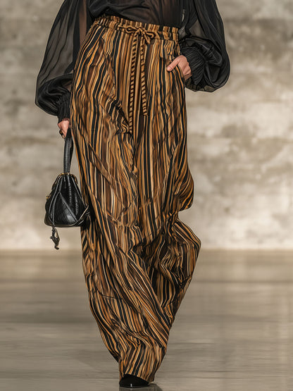 Elegant black off-the-shoulder top and striped wide-leg trousers set