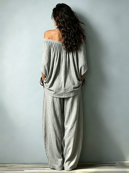 Loose Two-Piece Set Featuring An Off-Shoulder Grey Cotton Top With Three-Quarter Sleeves And Matching Trousers