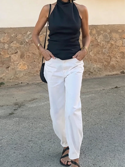 Casual black halter-neck tank top and white trousers set